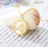 The Double sided Zodiac necklace